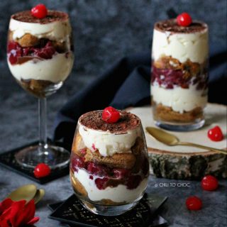 3 different glasses filled with black forest tiramisu.