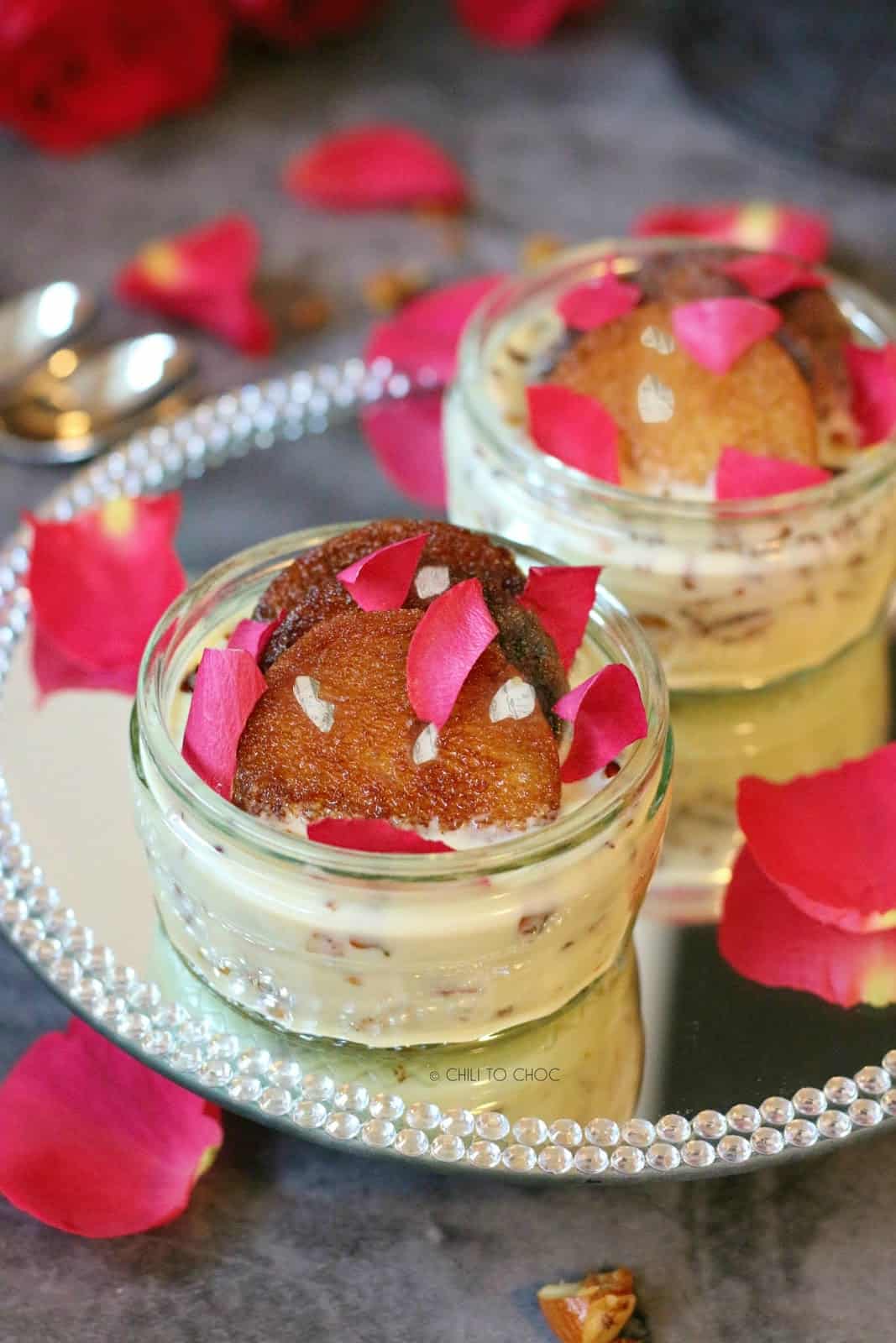 Fried bread slices in small jars filled with milk syrup.