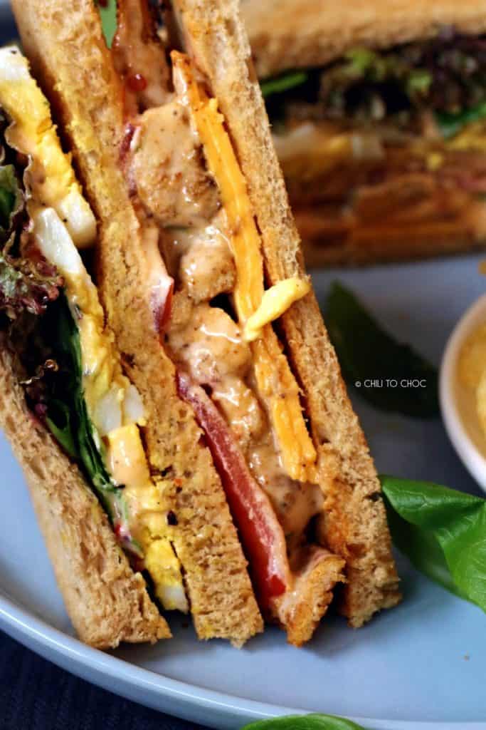 Closeup of the layers in Tandoori Chicken Club Sandwich