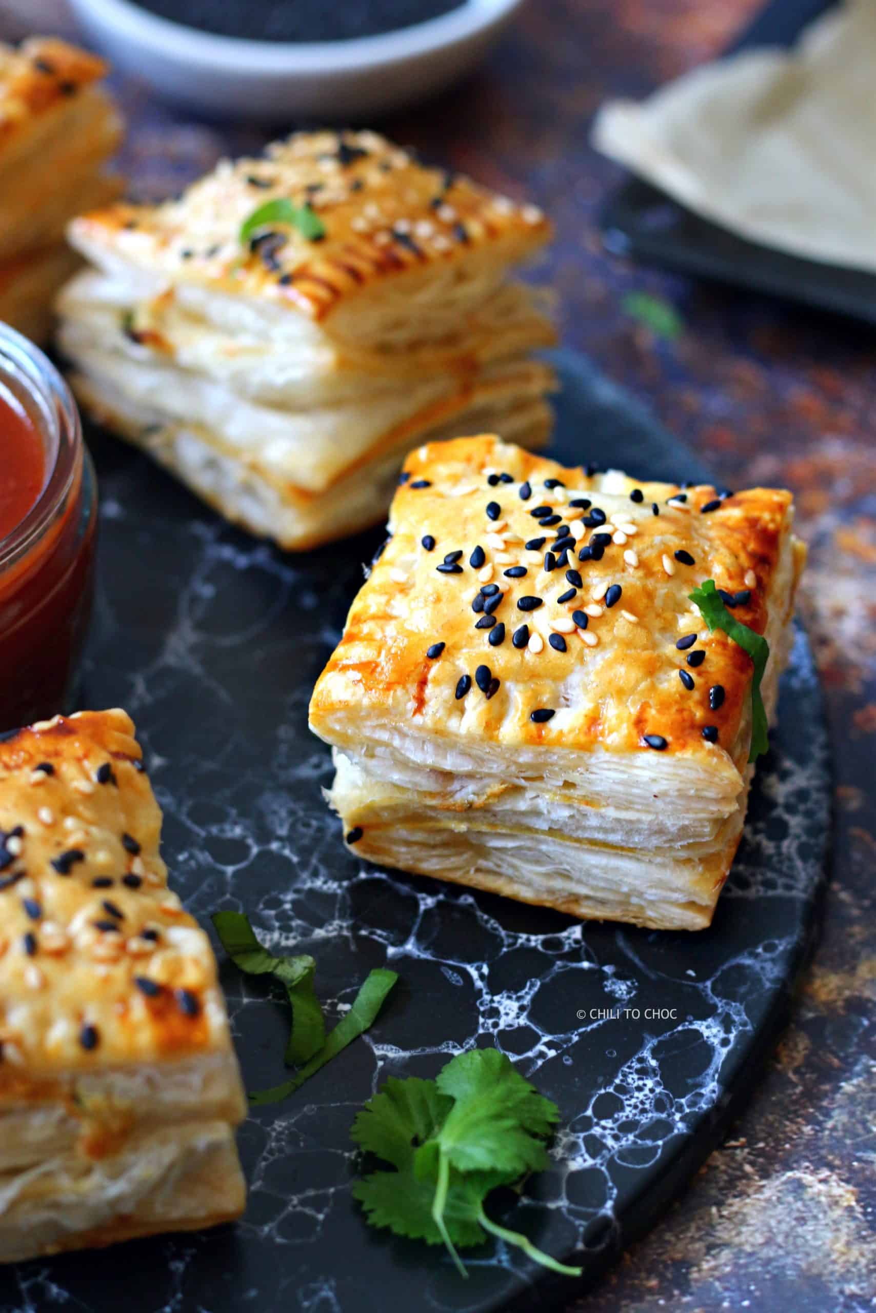 Chicken patties with sesame seeds on top