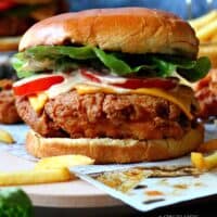 KFC Crispy Chicken Burger with french fries around it