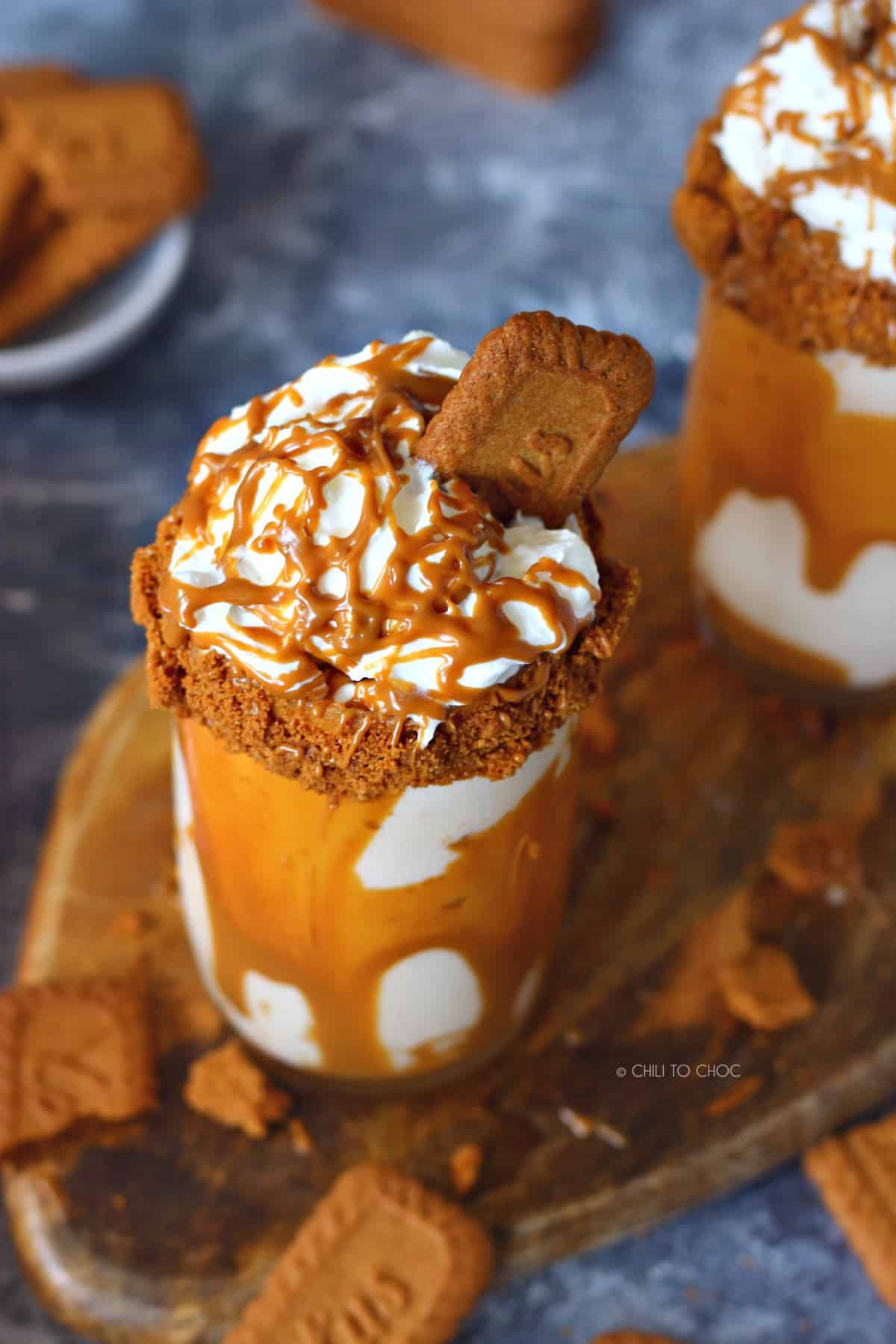 Biscoff Milkshake with whipped cream, cookie spread and Biscoff cookie.