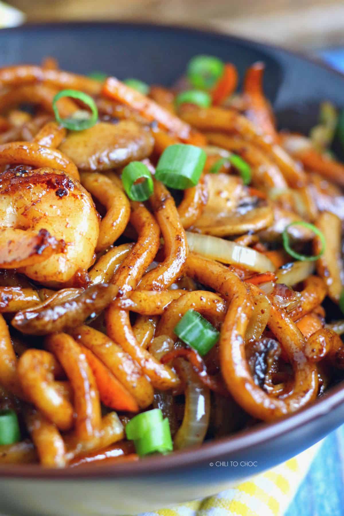 Udon noodles tossed in a savoury sauce with shrimp