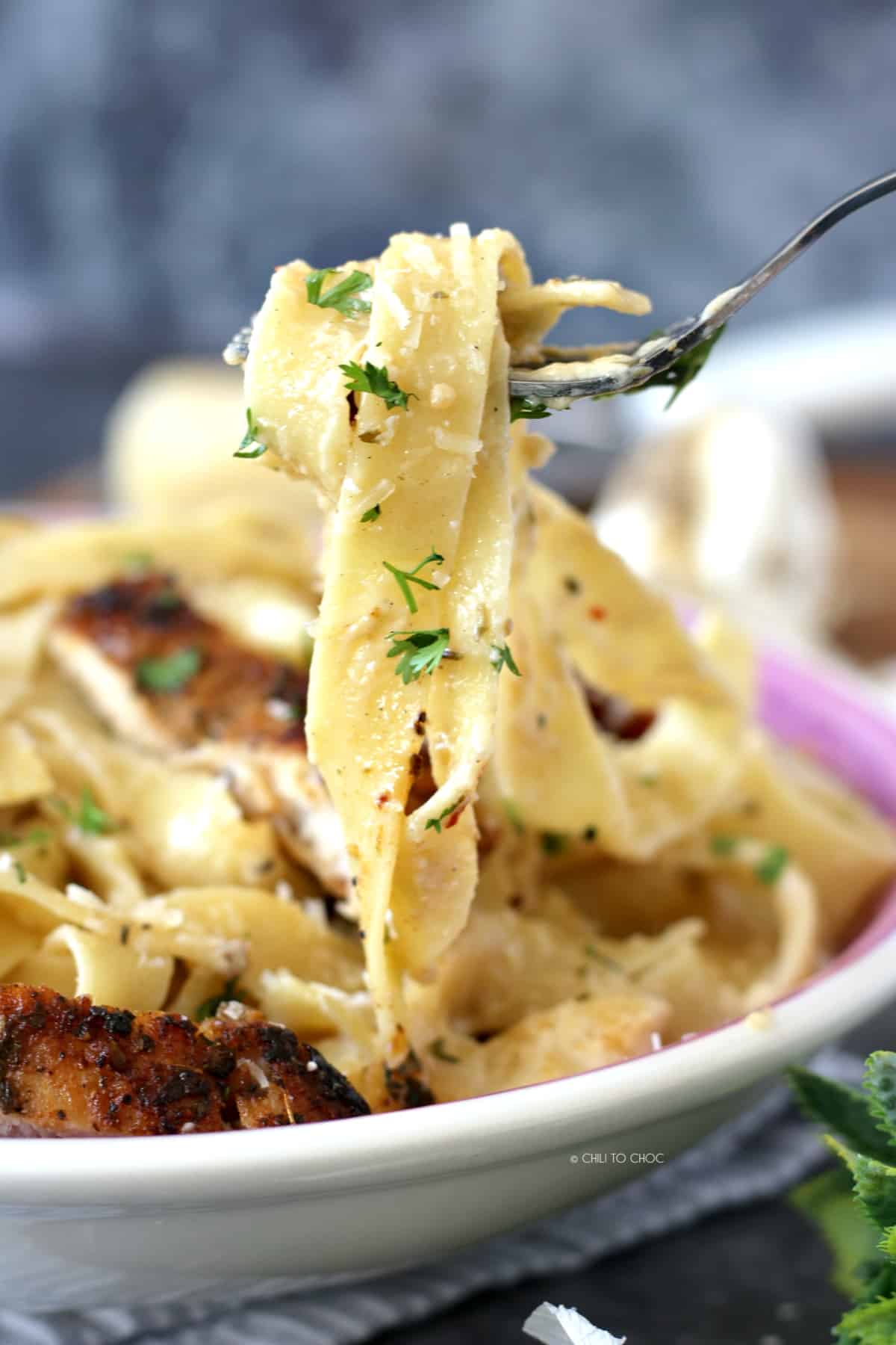 Fettuccine pasta on a fork