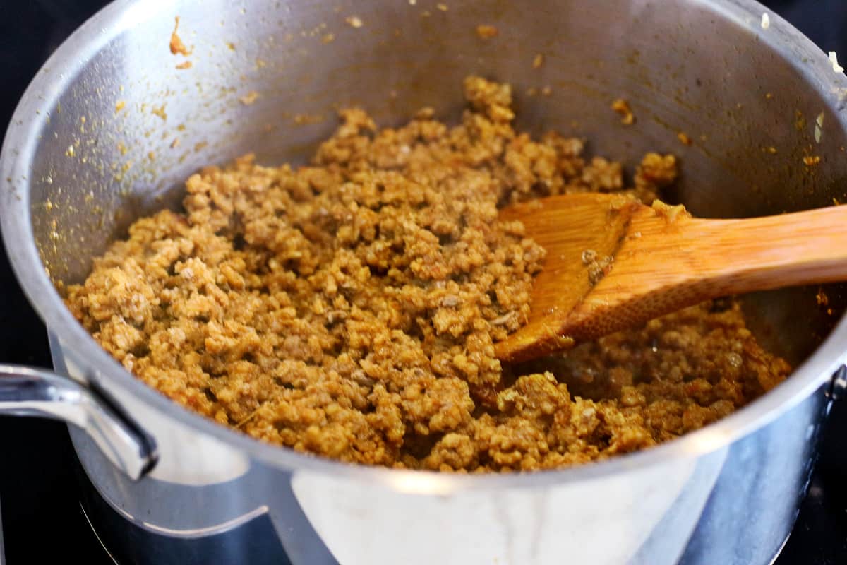 Cooking minced meat in a pot.