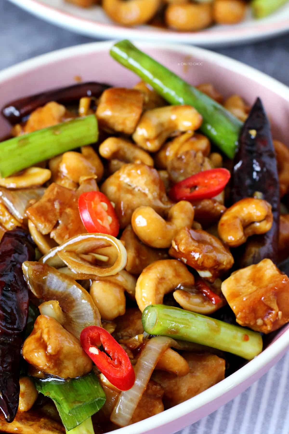 Thai Cashew Nut Chicken Chicken with cashews, onions and red chilies.