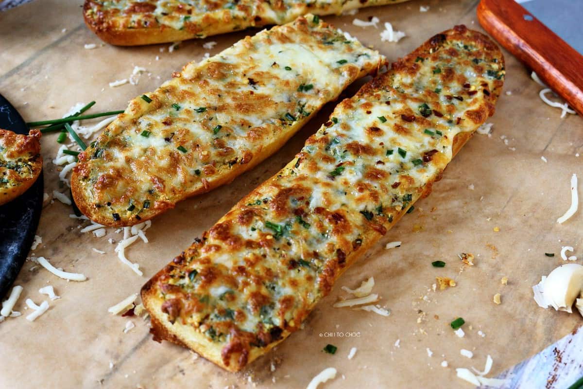 Cheesy garlic bread on a baking paper