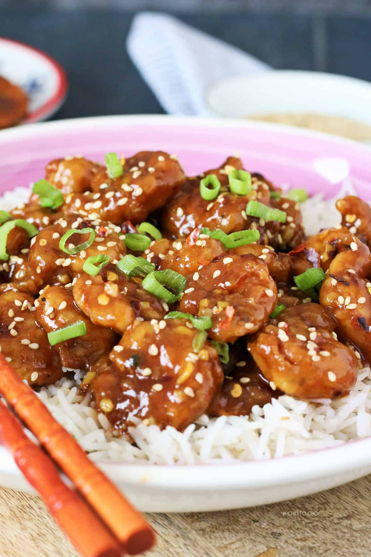 General Tso's Shrimp garnished with sesame seeds and spring onion