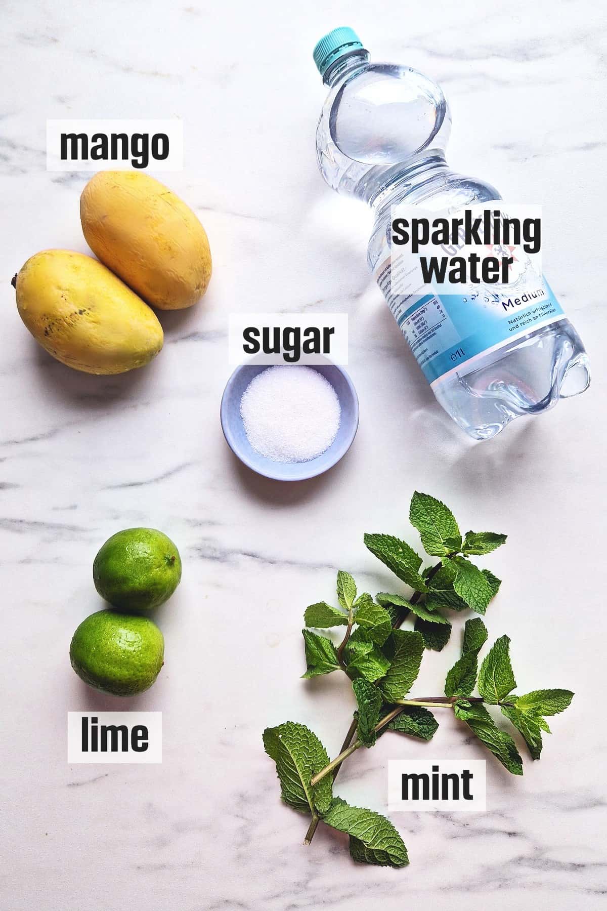 Ingredients for making non alcoholic Mango Mojito.
