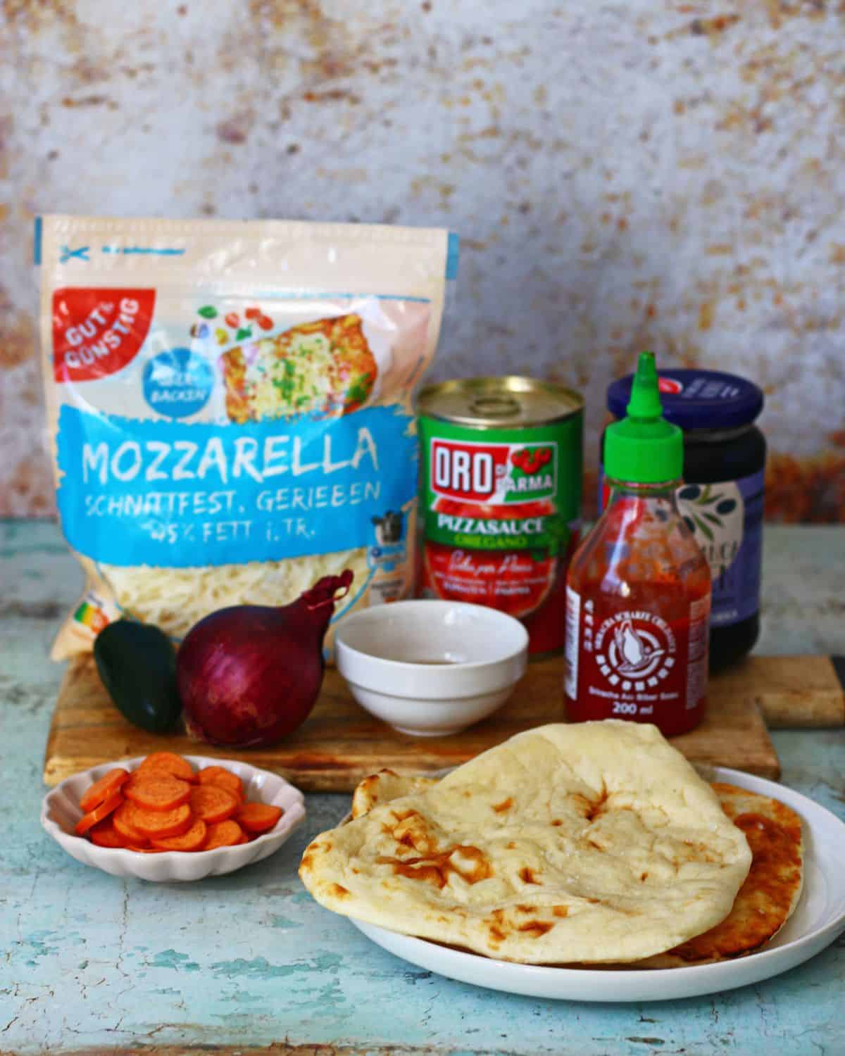 Ingredients for making hot honey flatbread pizza.