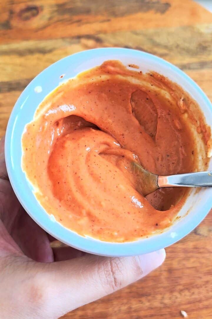 Homemade creamy tandoori mayo in a small bowl.